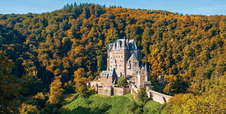 Autumnal foliage surrounding Eltz Castle, Germany